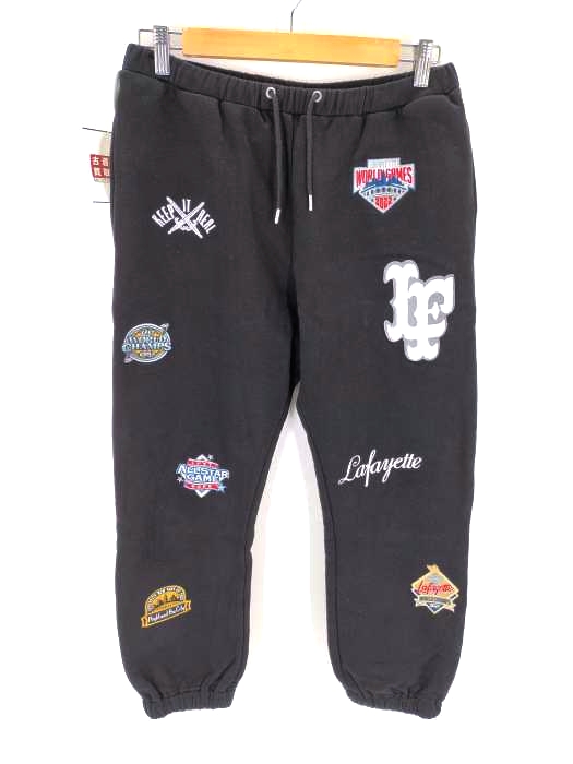 エルエフワイティー LFYT 22AW ALLOVER CHAMPION EMBLEM SWEAT PANTS メンズ JPN：M