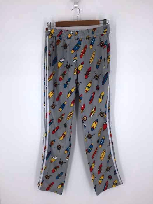 adidas Originals by Jeremy Scott(アディダスオリジナルスバイジェレミースコット) 総柄トラックパンツ メンズ O